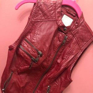 Bebe red color leather vest .